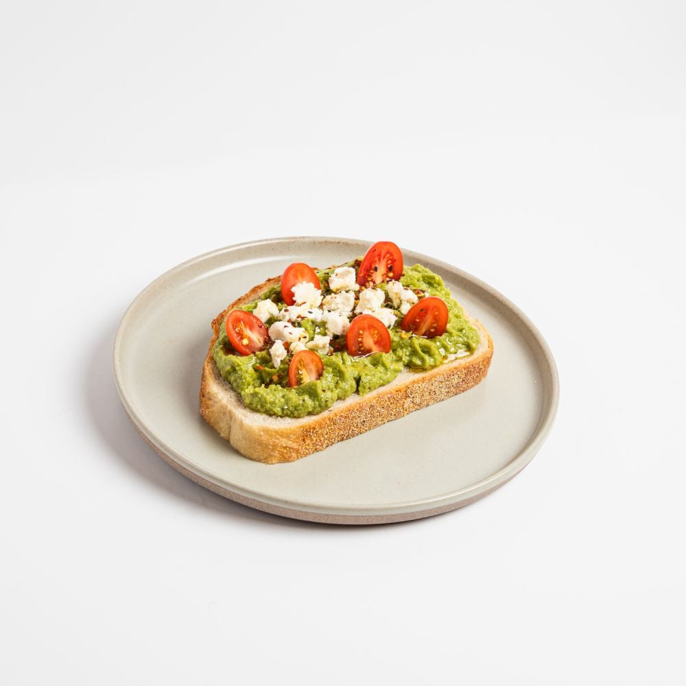 Food Menu | LIC Avocado toast with Feta and tomato.